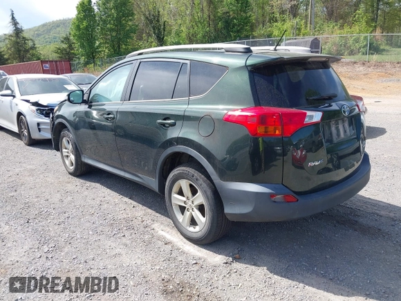 2013 Toyota RAV4 XLE with VIN 2T3RFREV9DW113610, listed as a IAAI auction lot 42103411 with 191,674 mi miles and . Bid and sale history available at carsss.com. Image 3.