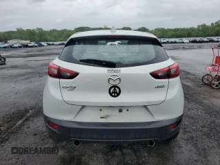 2016 Mazda CX-3 Grand Touring z VIN JM1DKBD77G0105451, wystawiony jako Copart lot #58341495 z przebiegiem 109 525 mil mil oraz Szkody całkowita. Historia ofert i sprzedaży dostępna na DreamBid. Obrazek 6.