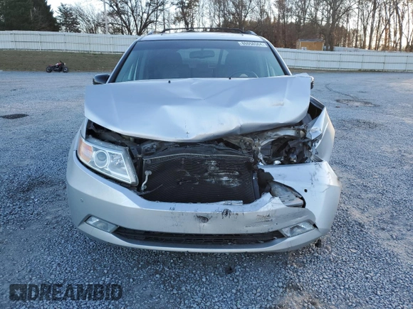 2012 Honda Odyssey Touring with VIN 5FNRL5H9XCB027758, listed as a Copart auction lot 86058504 with 164,860 mi miles and Salvage Title. Bid and sale history available at DreamBid. Image 5.