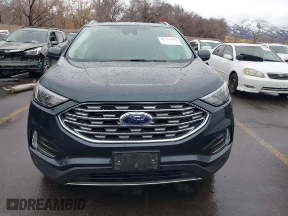 2022 Ford Edge SEL z VIN 2FMPK4J90NBA71360, wystawiony jako IAAI lot #41724316 z przebiegiem 35 309 mil mil oraz . Historia ofert i sprzedaży dostępna na DreamBid. Obrazek 13.