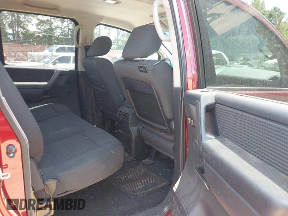 2013 Nissan Titan SV with VIN 1N6BA0ED5DN310166, listed as a IAAI auction lot 42583460 with 85,673 mi miles and . Bid and sale history available at DreamBid. Image 8.