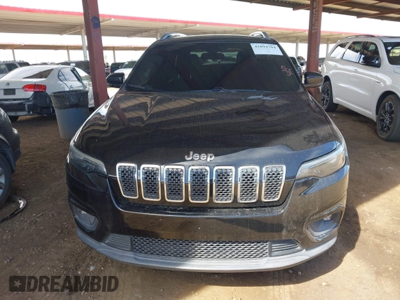 2019 Jeep Cherokee Latitude Plus z VIN 1C4PJLLB2KD420090, wystawiony jako IAAI lot #42094704 z przebiegiem 81 545 mil mil oraz . Historia ofert i sprzedaży dostępna na DreamBid. Obrazek 12.
