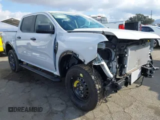 2024 Ford Ranger with VIN 1FTER4HPXRLE39741, listed as a IAAI auction lot 41471689 with 301 mi miles and . Bid and sale history available at DreamBid. Image 1.