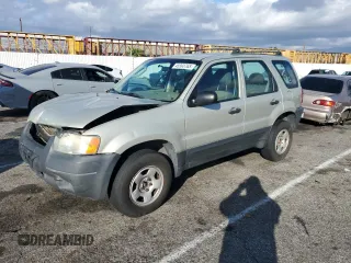 2004 Ford Escape XLS with VIN 1FMYU021X4KA41111, listed as a Copart auction lot 45393765 with 125,492 mi miles and Salvage Title. Bid and sale history available at DreamBid. Image 1.