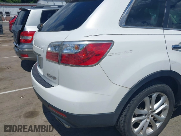 2012 Mazda CX-9 Grand Touring with VIN JM3TB2DA0C0360225, listed as a IAAI auction lot 42181667 with 195,306 mi miles and . Bid and sale history available at DreamBid. Image 6.