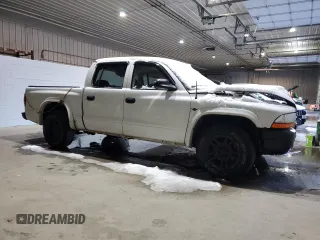 2004 Dodge Dakota Sport with VIN 1D7HL38K24S579283, listed as a Copart auction lot 83004224 with 0 mi miles and Salvage Title. Bid and sale history available at carsss.com. Image 4.
