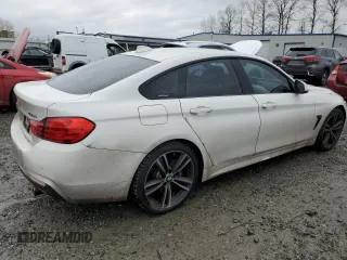 2015 BMW 4 Series 435i xDrive with VIN WBA4B3C56FD669599, listed as a Copart auction lot 43461545 with 186,082 mi miles and Salvage title. Bid and sale history available at DreamBid. Image 3.