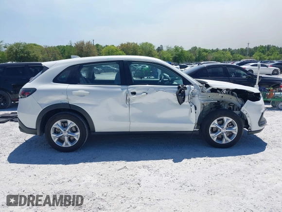 2023 Honda HR-V LX with VIN 3CZRZ1H33PM717656, listed as a IAAI auction lot 42022154 with 21,196 mi miles and . Bid and sale history available at DreamBid. Image 12.