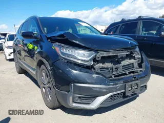 2020 Honda CR-V Touring with VIN 2HKRW2H94LH653538, listed as a IAAI auction lot 41740336 with 45,346 mi miles and . Bid and sale history available at DreamBid. Image 1.