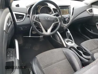 2014 Hyundai Veloster RE:FLEX z VIN KMHTC6AD2EU216453, wystawiony jako Copart lot #87090324 z przebiegiem 147 771 mil mil oraz Czysty tytuł • Clean title. Historia ofert i sprzedaży dostępna na DreamBid. Obrazek 8.