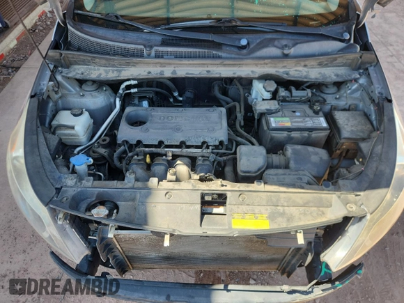 2011 Kia Sportage LX with VIN KNDPBCA22B7017760, listed as a Copart auction lot 60570025 with 118,617 mi miles and Salvage title. Bid and sale history available at DreamBid. Image 12.