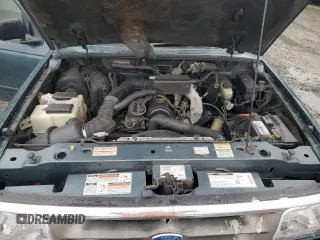 1996 Ford Ranger XL z VIN 1FTCR14A9TPB34108, wystawiony jako Copart lot #59003455 z przebiegiem 295 842 mil mil oraz Czysty tytuł • Clean title. Historia ofert i sprzedaży dostępna na DreamBid. Obrazek 11.