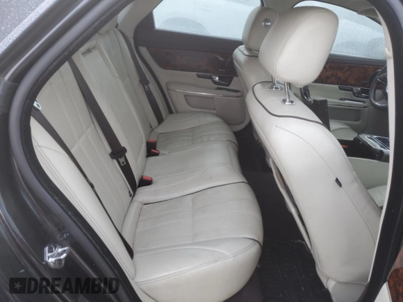 2013 Jaguar XJ with VIN SAJWA1C70D8V41578, listed as a Copart auction lot 89080585 with 76,063 mi miles and Salvage Title. Bid and sale history available at DreamBid. Image 10.