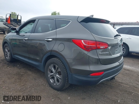 2014 Hyundai Santa Fe z VIN 5XYZTDLB1EG144290, wystawiony jako IAAI lot #42126367 z przebiegiem 138 525 mil mil oraz . Historia ofert i sprzedaży dostępna na DreamBid. Obrazek 3.