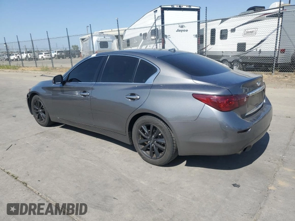 2014 Infiniti Q50 Premium with VIN JN1BV7AP2EM677469, listed as a Copart auction lot 61627125 with 106,670 mi miles and Salvage title. Bid and sale history available at DreamBid. Image 2.