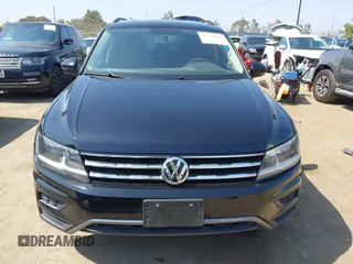 2018 Volkswagen Tiguan S with VIN 3VV1B7AX7JM092033, listed as a IAAI auction lot 42373619 with 124,775 mi miles and . Bid and sale history available at DreamBid. Image 12.