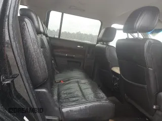 2009 Ford Flex SEL z VIN 2FMDK52C99BA83693, wystawiony jako Copart lot #49335735 z przebiegiem 230 562 mil mil oraz Szkoda całkowita • Salvage title. Historia ofert i sprzedaży dostępna na DreamBid. Obrazek 11.
