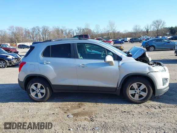 2016 Chevrolet Trax LT z VIN 3GNCJLSB7GL162268, wystawiony jako IAAI lot #41753118 z przebiegiem 123 599 mil mil oraz . Historia ofert i sprzedaży dostępna na DreamBid. Obrazek 13.