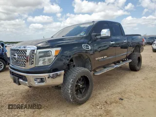 2016 Nissan Titan Platinum Reserve z VIN 1N6BA1F42GN517624, wystawiony jako Copart lot #60058855 z przebiegiem Nie podano mil oraz Czysty tytuł • Clean title. Historia ofert i sprzedaży dostępna na DreamBid. Obrazek 1.