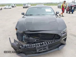 2021 Ford Mustang GT z VIN 1FA6P8CF2M5149691, wystawiony jako IAAI lot #41937878 z przebiegiem 57 865 mil mil oraz . Historia ofert i sprzedaży dostępna na DreamBid. Obrazek 12.