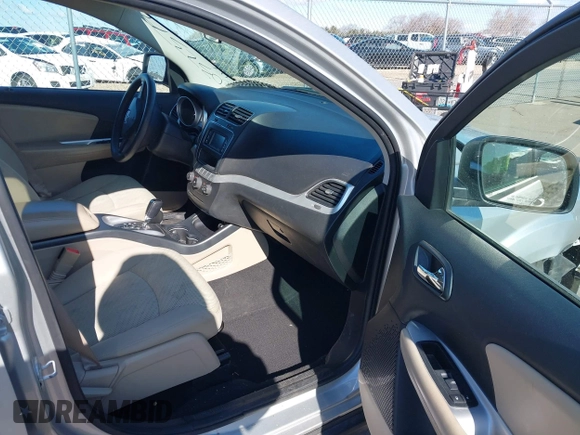 2013 Dodge Journey SXT with VIN 3C4PDDBG4DT506900, listed as a IAAI auction lot 42032379 with 130,911 mi miles and . Bid and sale history available at DreamBid. Image 5.