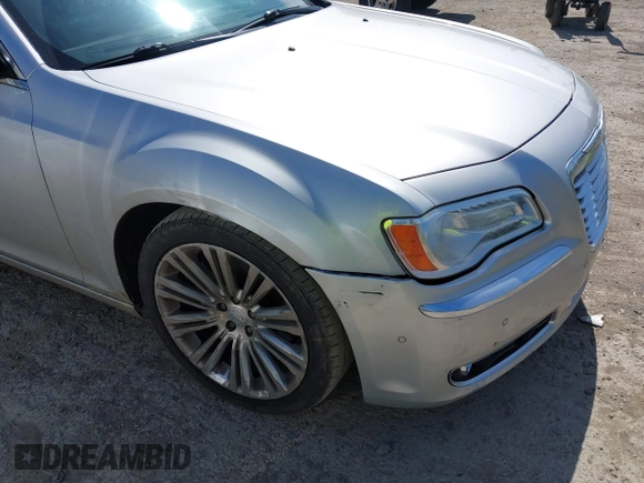 2012 Chrysler 300 with VIN 2C3CCAET2CH207796, listed as a IAAI auction lot 42029639 with 142,929 mi miles. Bid and sale history available at carsss.com. Image 6.