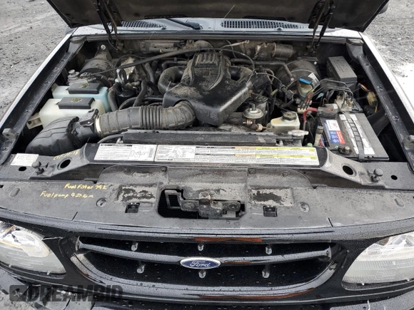 2000 Ford Explorer Limited with VIN 1FMDU75EXYZA76329, listed as a Copart auction lot 80952474 with 90,637 mi miles and Salvage title. Bid and sale history available at DreamBid. Image 13.