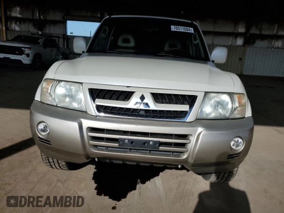 2006 Mitsubishi Montero Limited z VIN JA4MW51SX6J003398, wystawiony jako Copart lot #70511684 z przebiegiem 167 981 mil mil oraz Tytuł czysty. Historia ofert i sprzedaży dostępna na DreamBid. Obrazek 5.