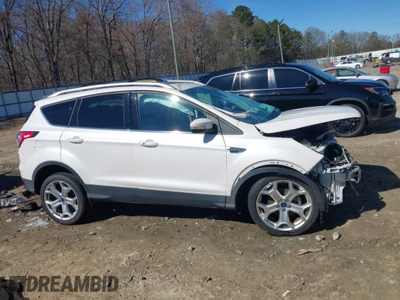2017 Ford Escape Titanium with VIN 1FMCU0JD6HUE01006, listed as a IAAI auction lot 41632918 with 70,927 mi miles. Bid and sale history available at carsss.com. Image 13.