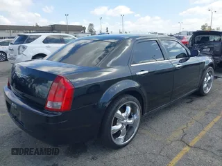 2007 Chrysler 300 with VIN 2C3KA43R57H852331, listed as a IAAI auction lot 41946742 with 211,168 mi miles. Bid and sale history available at carsss.com. Image 4.