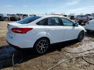 2018 Ford Focus SE with VIN 1FADP3FE7JL317359, listed as a Copart auction lot 53309065 with 107,066 mi miles and Clean Title. Bid and sale history available at carsss.com. Image 3.