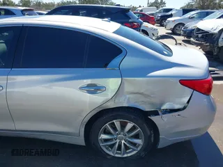 2014 Infiniti Q50 Sport with VIN JN1BV7AR7EM701783, listed as a IAAI auction lot 41757085 with 115,352 mi miles and . Bid and sale history available at DreamBid. Image 6.