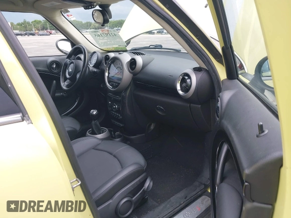 2011 MINI Countryman S z VIN WMWZC5C50BWM11267, wystawiony jako IAAI lot #42197165 z przebiegiem 87 067 mil mil oraz . Historia ofert i sprzedaży dostępna na DreamBid. Obrazek 5.