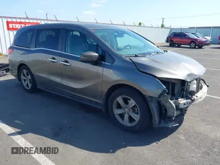 2018 Honda Odyssey EX-L z VIN 5FNRL6H74JB049269, wystawiony jako IAAI lot #42148794 z przebiegiem 108 808 mil mil oraz . Historia ofert i sprzedaży dostępna na DreamBid. Obrazek 1.