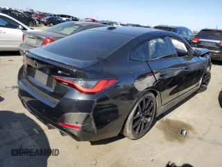 2022 BMW i4 M50 with VIN WBY33AW06NFM16543, listed as a Copart auction lot 52206564 with 11,514 mi miles. Bid and sale history available at carsss.com. Image 3.