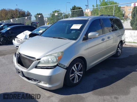 2005 Honda Odyssey TOURING with VIN 5FNRL38865B128519, listed as a IAAI auction lot 41830182 with 171,010 mi miles. Bid and sale history available at carsss.com. Image 2.