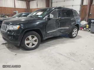 2011 Jeep Grand Cherokee Limited with VIN 1J4RR5GT5BC556200, listed as a IAAI auction lot 41489245 with 112,165 mi miles. Bid and sale history available at carsss.com. Image 20.