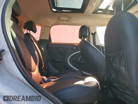 2011 MINI Countryman with VIN WMWZB3C59BWH94541, listed as a Copart auction lot 87177514 with 186,979 mi miles and Salvage title. Bid and sale history available at DreamBid. Image 11.