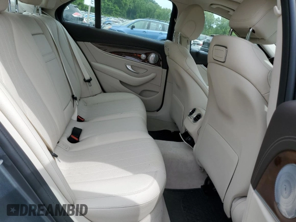 2018 Mercedes-Benz E 300 with VIN WDDZF4KBXJA337966, listed as a Copart auction lot 58718355 with 54,264 mi miles and Salvage title. Bid and sale history available at DreamBid. Image 10.