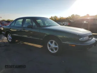 1996 Oldsmobile LSS z VIN 1G3HY52K1T4801881, wystawiony jako Copart lot #75327304 z przebiegiem 123 374 mil mil oraz Szkody całkowita. Historia ofert i sprzedaży dostępna na DreamBid. Obrazek 4.