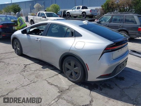 2024 Toyota Prius LE with VIN JTDACAAU3R3024761, listed as a IAAI auction lot 41992059 with 14,119 mi miles and . Bid and sale history available at DreamBid. Image 3.