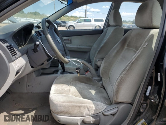 2006 Kia Spectra EX with VIN KNAFE121065348140, listed as a Copart auction lot 70874144 with 181,710 mi miles and Salvage Title. Bid and sale history available at carsss.com. Image 7.