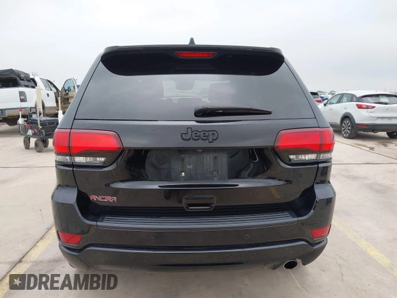 2021 Jeep Grand Cherokee Laredo X with VIN 1C4RJEAG8MC714539, listed as a IAAI auction lot 42190686 with 59,359 mi miles and . Bid and sale history available at DreamBid. Image 16.