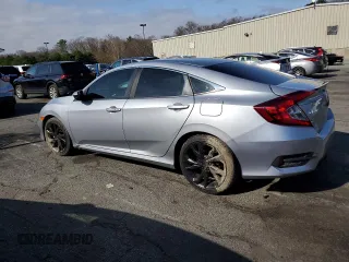 2019 Honda Civic Sport with VIN 2HGFC2F86KH602444, listed as a Copart auction lot 52155755 with 51,477 mi miles and Salvage Title. Bid and sale history available at DreamBid. Image 2.