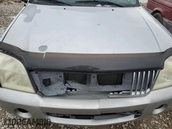 2002 Mercury Mountaineer z VIN 4M2DU86W02UJ22573, wystawiony jako Copart lot #83585694 z przebiegiem Nie podano mil oraz Szkody całkowita. Historia ofert i sprzedaży dostępna na DreamBid. Obrazek 11.