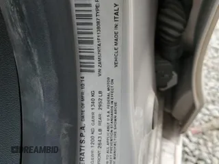 2015 Maserati Ghibli S Q4 z VIN ZAM57RTA1F1138087, wystawiony jako Copart lot #58412195 z przebiegiem 111 206 mil mil oraz Szkoda całkowita • Salvage title. Historia ofert i sprzedaży dostępna na DreamBid. Obrazek 12.