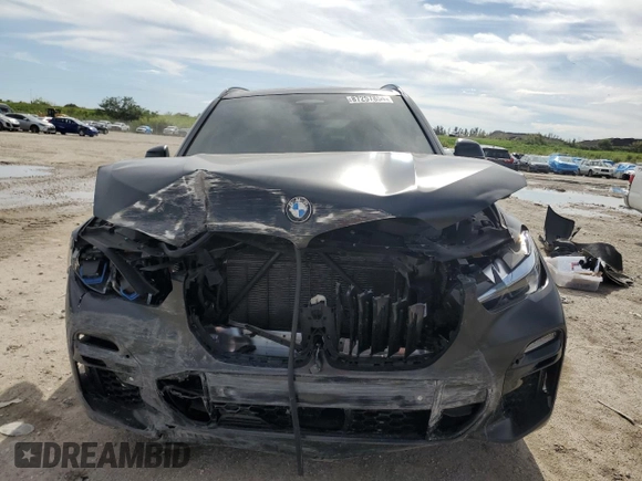 2021 BMW X5 M50i with VIN 5UXJU4C05M9G90231, listed as a Copart auction lot 87257854 with 54,704 mi miles and Non Repairable. Bid and sale history available at carsss.com. Image 5.