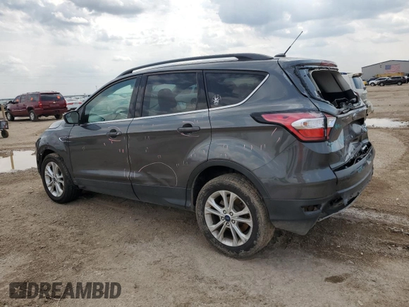 2018 Ford Escape SE with VIN 1FMCU0G90JUB62738, listed as a Copart auction lot 63380654 with 157,762 mi miles and Salvage Title. Bid and sale history available at carsss.com. Image 2.