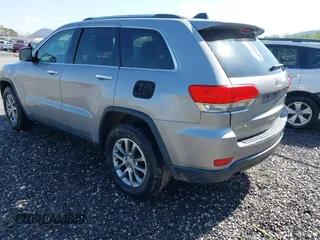 2014 Jeep Grand Cherokee Limited with VIN 1C4RJFBG5EC588971, listed as a IAAI auction lot 41971004 with 154,122 mi miles and . Bid and sale history available at DreamBid. Image 3.