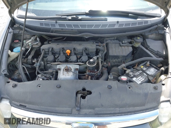 2006 Honda Civic LX with VIN 1HGFA16586L104230, listed as a IAAI auction lot 42215822 with 128,704 mi miles and . Bid and sale history available at DreamBid. Image 10.